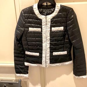 NEW- price reduction,-INC black and white jacket with zippered trim.